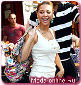 Beyonce с сумкой Patchwork Snakeskin Bag